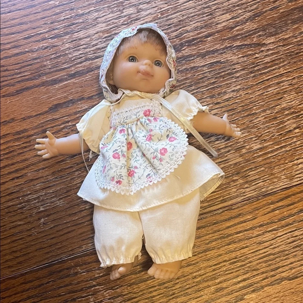Adorable Baby Doll with Floral Outfit